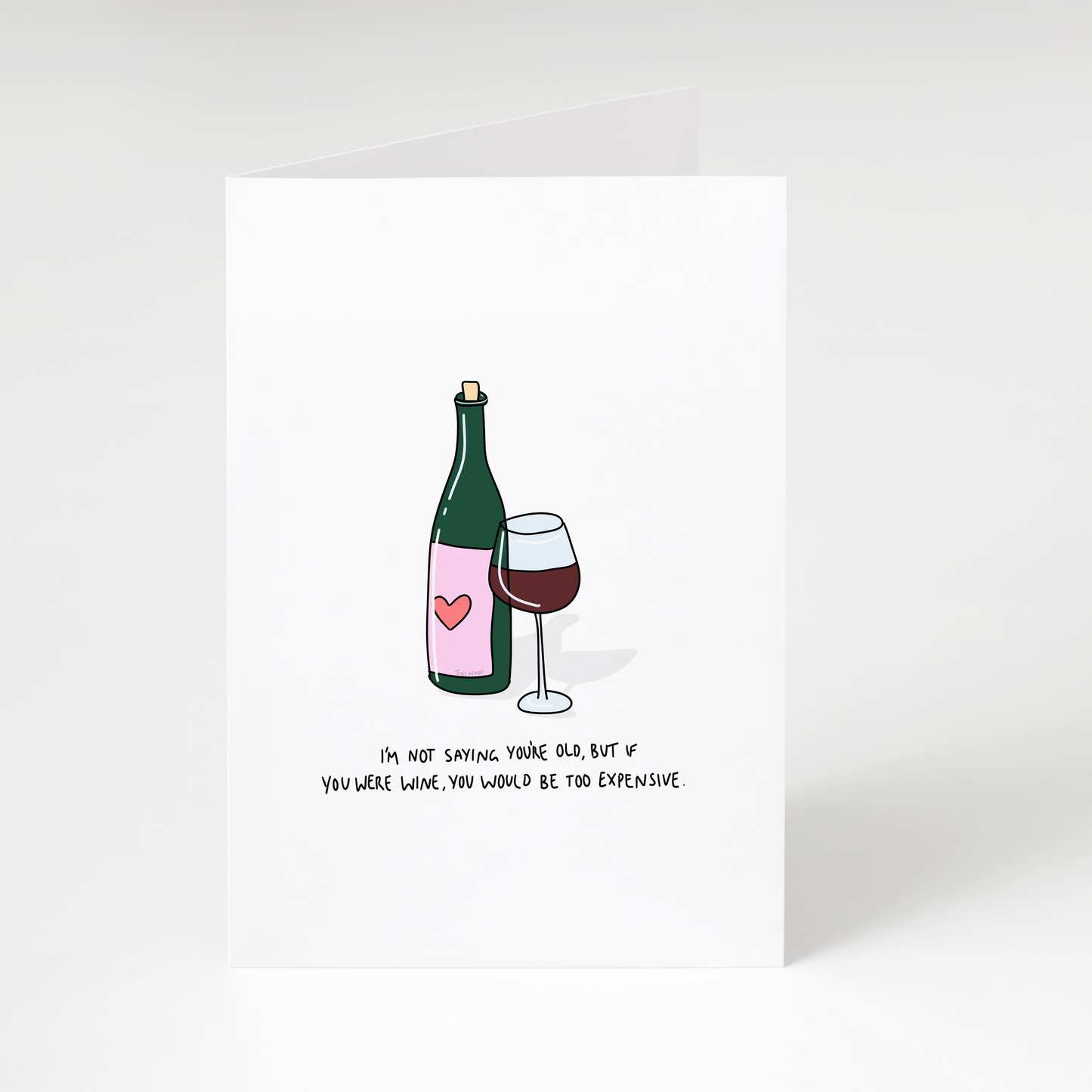 Wine bottle and glass with text “If you were wine, you would be too expensive” on white funny birthday greeting card