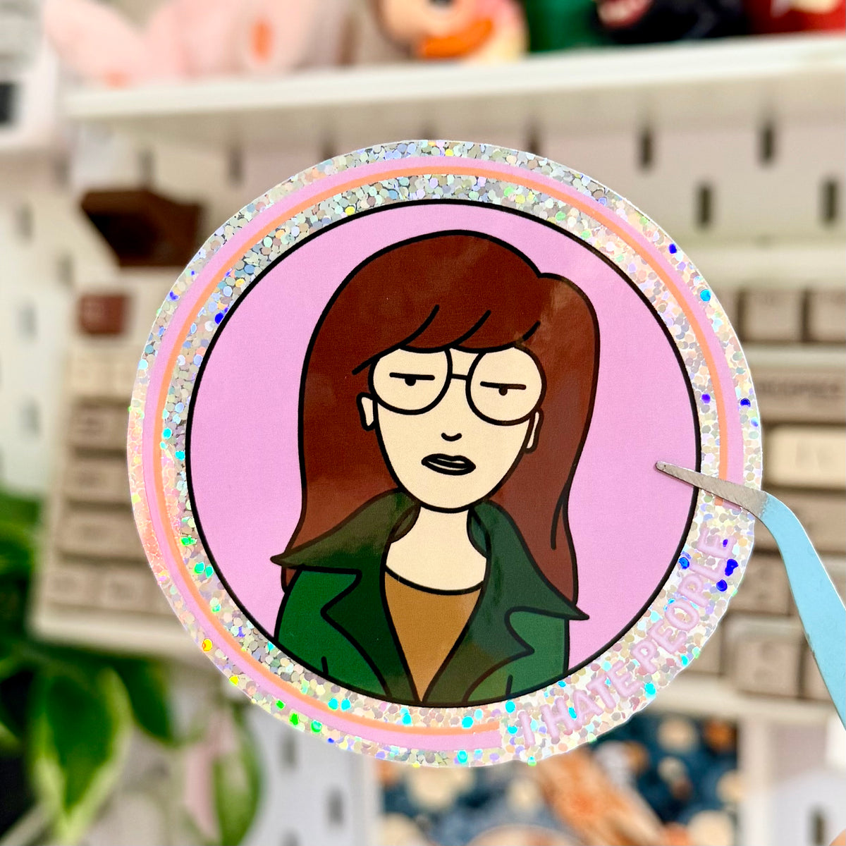 I Hate People Glitter Sticker featuring deadpan illustrated woman with I Hate People lettering.