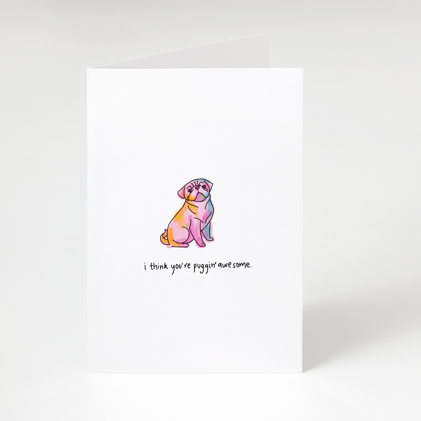 Colourful illustrated pug with text “I think you’re puggin’ awesome” on white greeting card