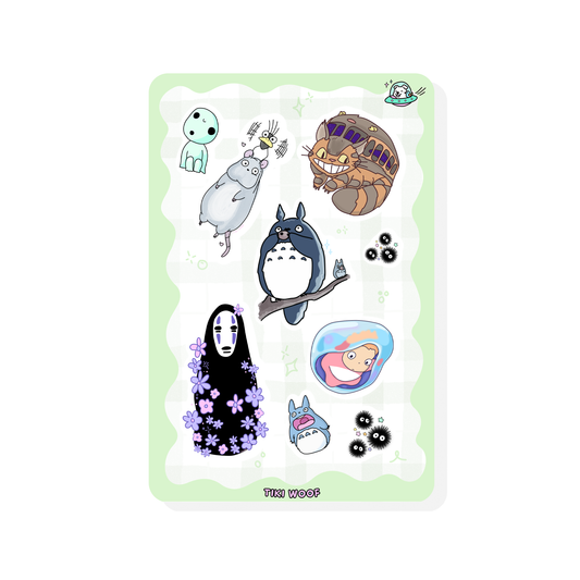 Mini sticker sheet featuring Studio Ghibli inspired characters including Totoro, No-Face, Ponyo, Catbus, soot sprites, and Kodama on a soft green checkered background.```
