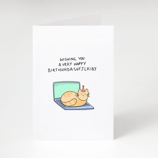 Cute cat wearing party hat sitting on laptop with text “Wishing you a very happy birthhhdashfjlky” on white birthday greeting card