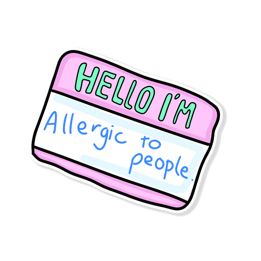 Funny pastel vinyl sticker that looks like a name tag reading “Hello I’m Allergic to People,” handmade by Tiki Woof Studio for introverts and sticker lovers.