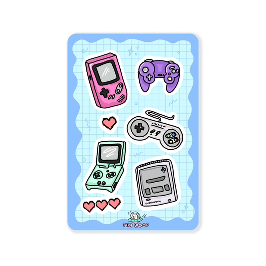 Sticker sheet featuring pastel retro gaming consoles, handhelds, and controllers on a blue grid background.```