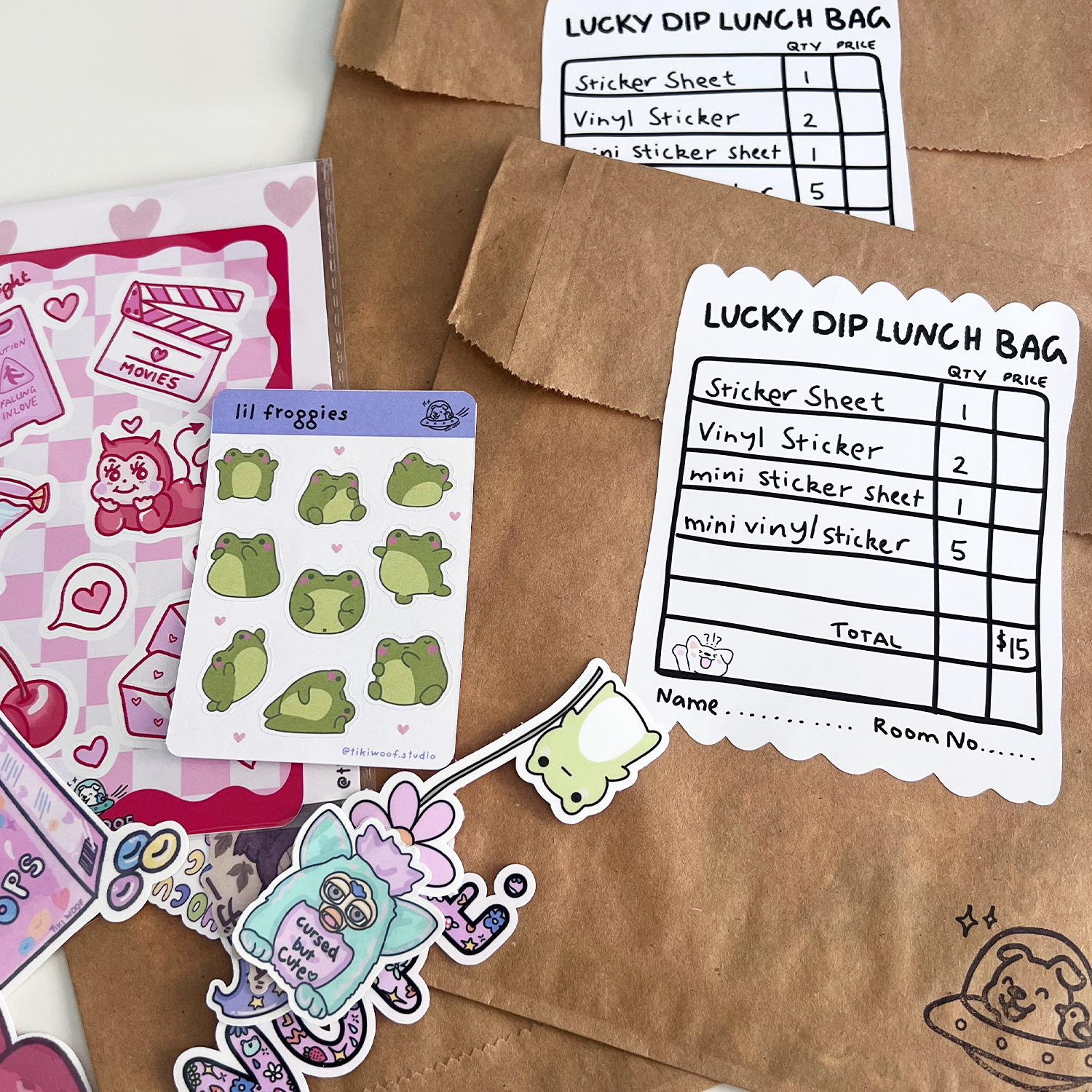 Back of Lucky Dip Lunch Bag sealed with a clover-themed good luck sticker on kraft paper.
