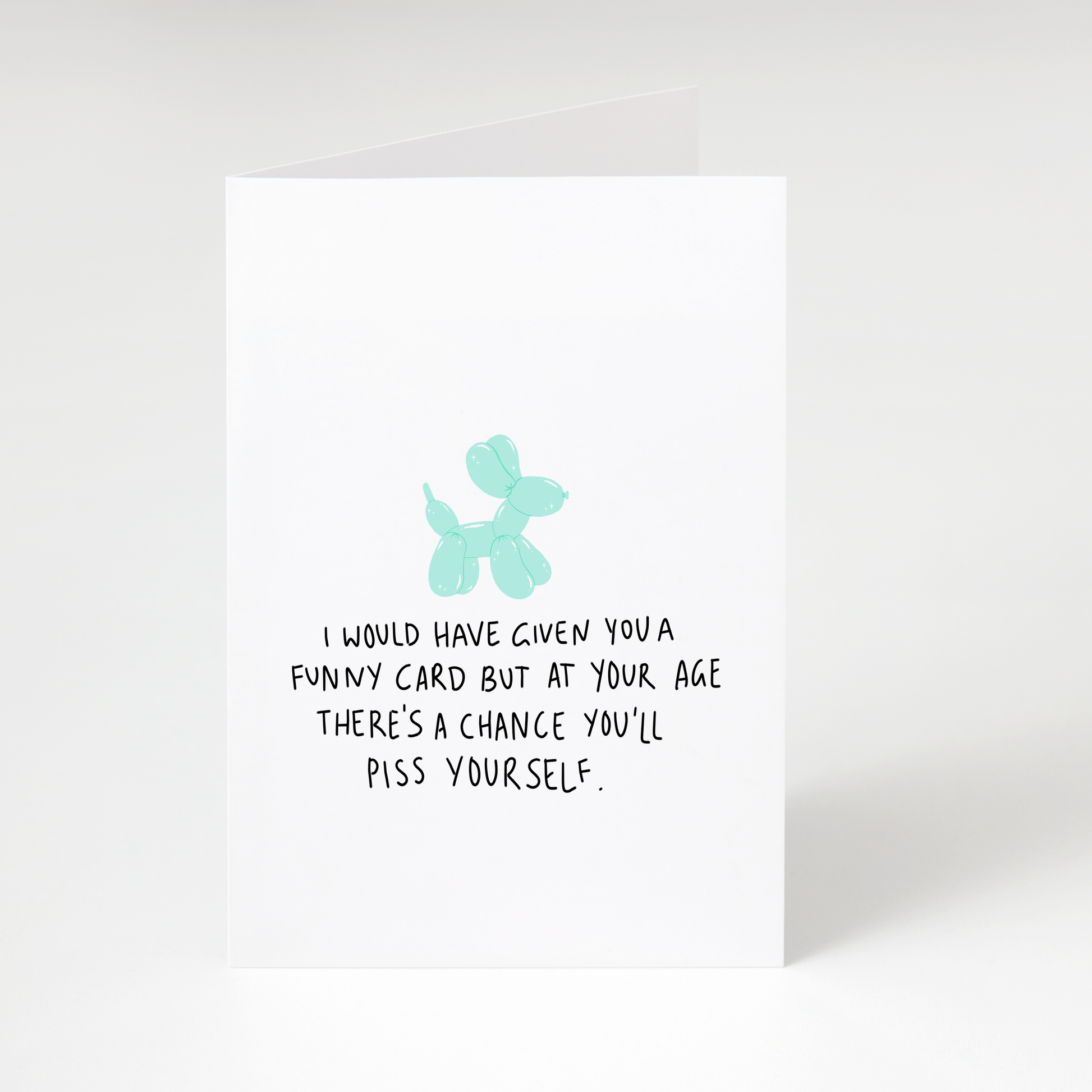 Funny rude birthday card with balloon dog and text about not giving a funny card in case you’ll laugh too hard
